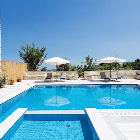 Warm yourself back up on the sun lounger after a dip in the pool