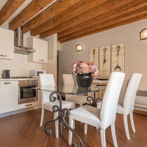 Prepare and enjoy a homecooked meal in the well-equipped kitchen with elegant dining area