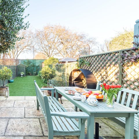 Pour yourself a glass of wine and relax outside as the sun starts to set