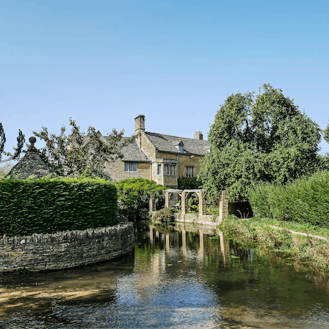 Visit pretty Bourton-on-the-Water – a ten-mile drive away