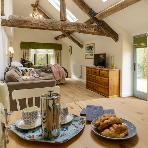 Take your time and enjoy a lazy breakfast under old barn beams