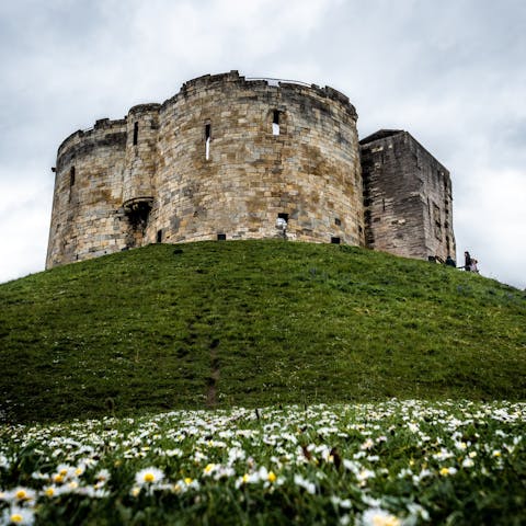 Take a brisk, hilltop talk to Clifford's Tower, five minutes away