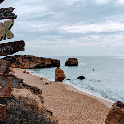 Explore the beautiful beaches dotted along the Algarve coast 