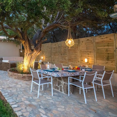 Spend evenings in your enchanting dining area, tucking into barbecued dinners beneath the old-growth tree