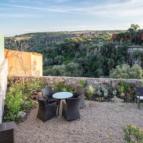 Sip your first coffee of the day with a view of the native landscape