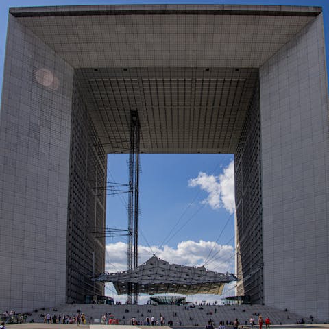 Admire the monumental Grand Arche of Puteaux, just an eight–minute drive away