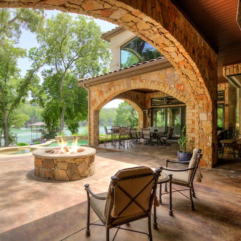 Relax with your loved ones by the fire pit as you watch the sunset