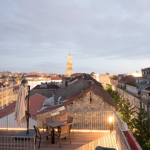 Share a bottle of Port on the magical roof terrace