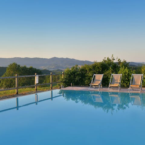 Savour the beautiful views whilst relaxing by the pool