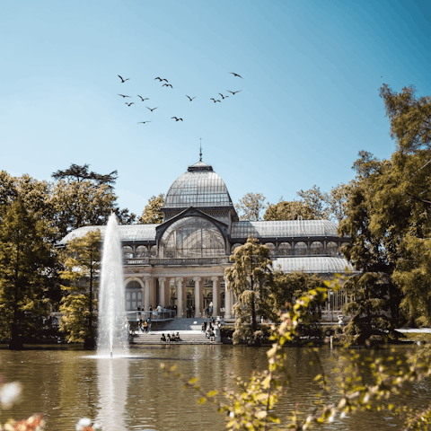 Swap the crowds for the green space of El Retiro Park – just a stroll away