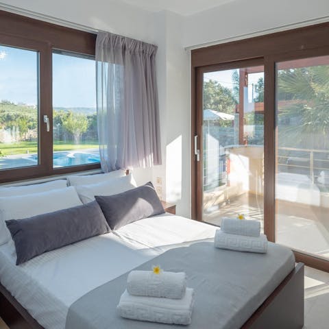 Step right out to the private balcony from your bright main bedroom
