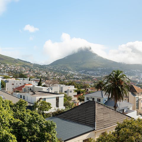 Take in skyline views over Cape Town from the dining room