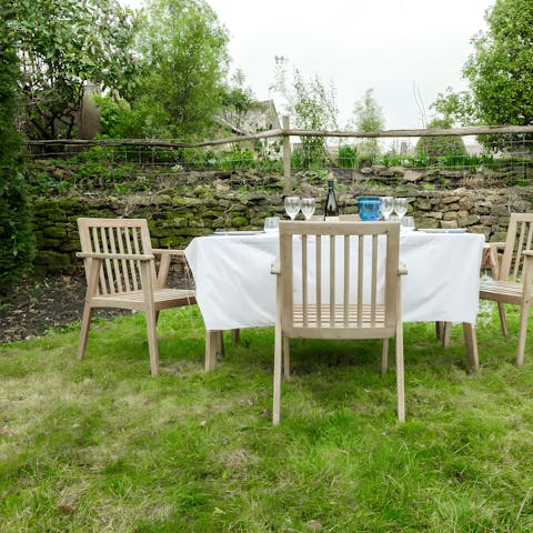 Enjoy a barbecue in the garden on a summer afternoon