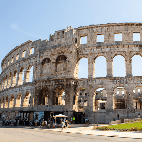 Explore the historical beauty of Pula (a thirteen-minute drive)