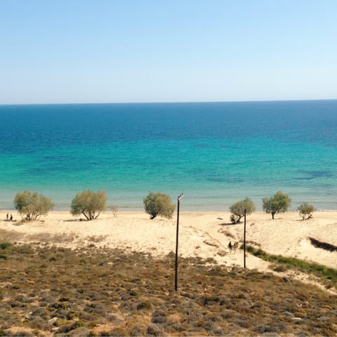 Spend a day by the sea – Agios Georgios Beach is just 500m away