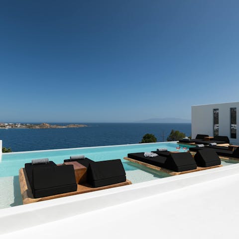 Swim out to the edge of the infinity pool for uninterrupted views of the Aegean 