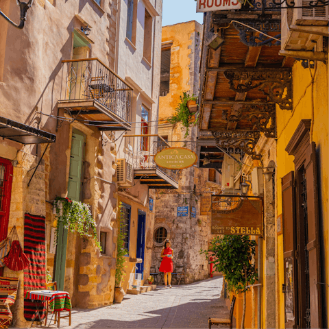 Lose yourself in the winding backstreets of Chania, a forty-minute drive away