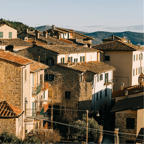 Wander the medieval streets that surround the home in the hilltop town of Cortona