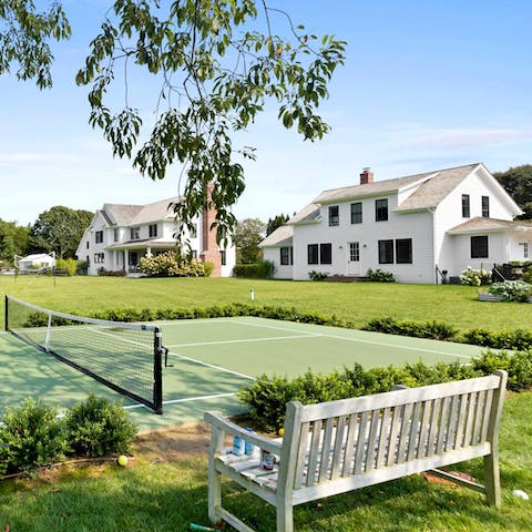 Practice your serve on the tennis court