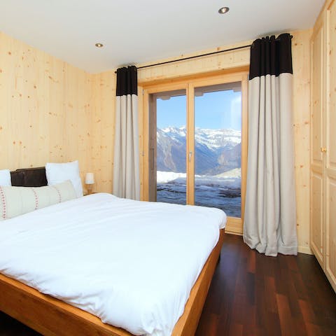 Wake up to views of the mountains through the French doors
