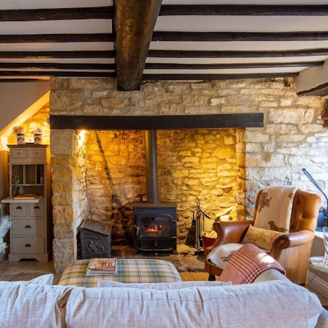 Cosy up in front of the wood burner after a day outdoors