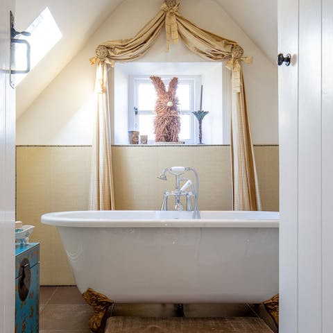 Relax in the roll-top bath to soothe tired muscles