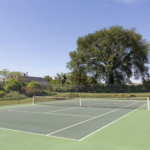 Practise your backhand on the newly laid tennis court