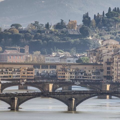 Admire stunning views of Florence's bridges from the balconies