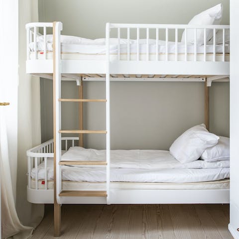 Tuck the children into their luxury bunkbeds