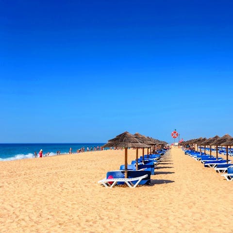 Make the 15-kilometre journey over to the Algarve coastline for sunbathing and swimming