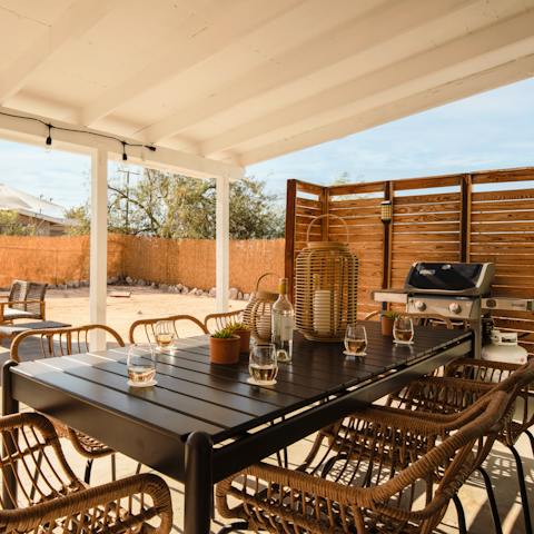 Heat up the grill and eat your meals on the covered deck