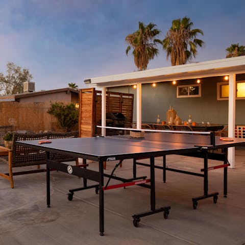 Enjoy a few outdoor games of table tennis 