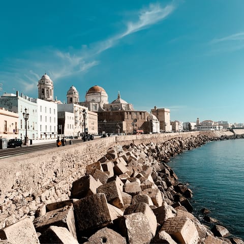 Explore the ancient port city of Cádiz, a 75-kilometre drive away