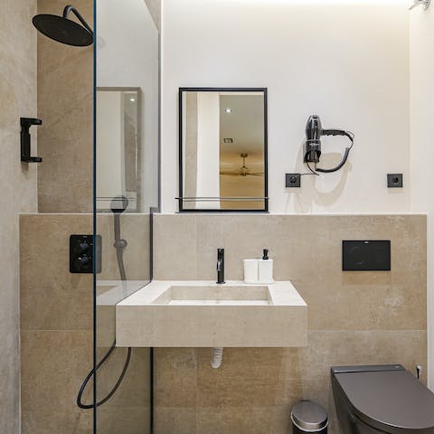 Start mornings with a refreshing soak under the rainfall shower