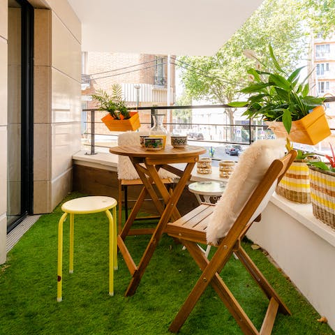 Pour yourself an apéritif and sip out on the apartment's terrace