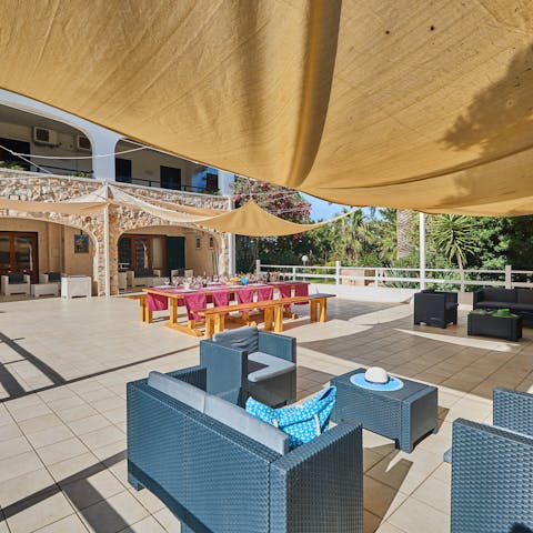 Dine alfresco under the gentle shade of the canopy