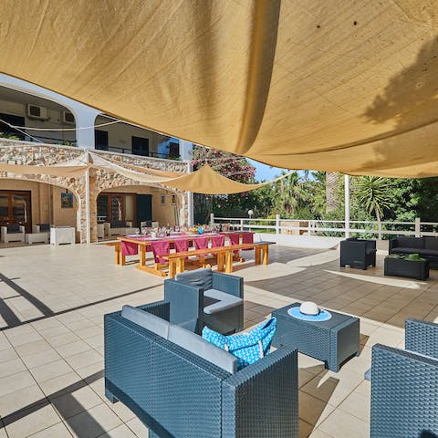 Dine alfresco under the gentle shade of the canopy