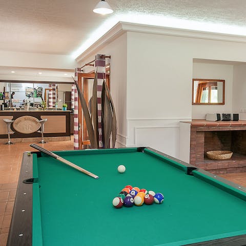 Shoot some pool as you enjoy a round of drinks in the bar