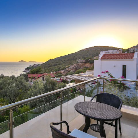 Relax with a sunset drink on the balcony