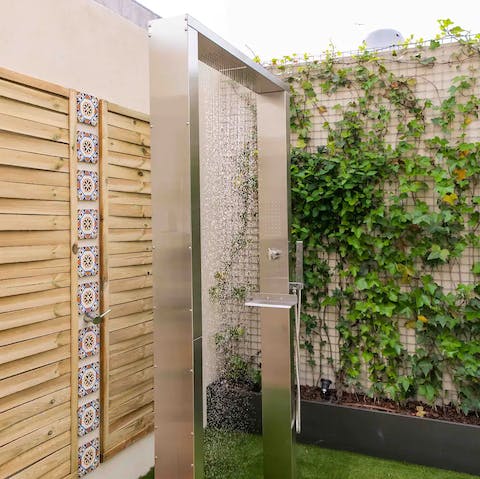 Cool off from the Portuguese heat under the outdoor waterfall shower