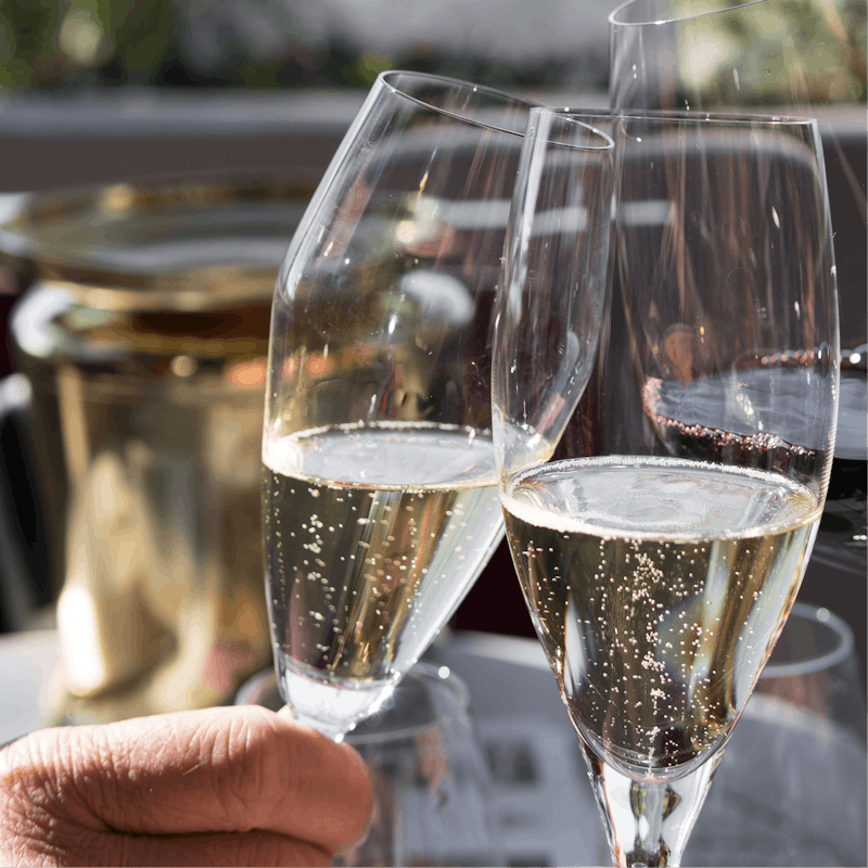 Pop open a bottle of champagne, courtesy of your host