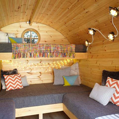 Cosy up with a book in the garden pod