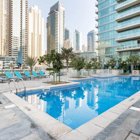 Have a dip in the communal pool when the Dubai sun is at its hottest