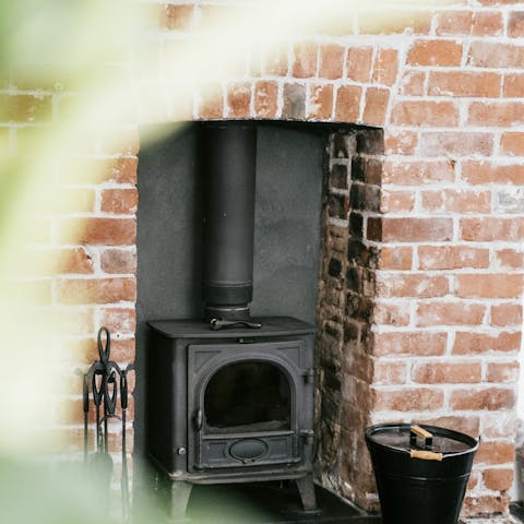Kick back in front of the log burner, watching movies and reading books