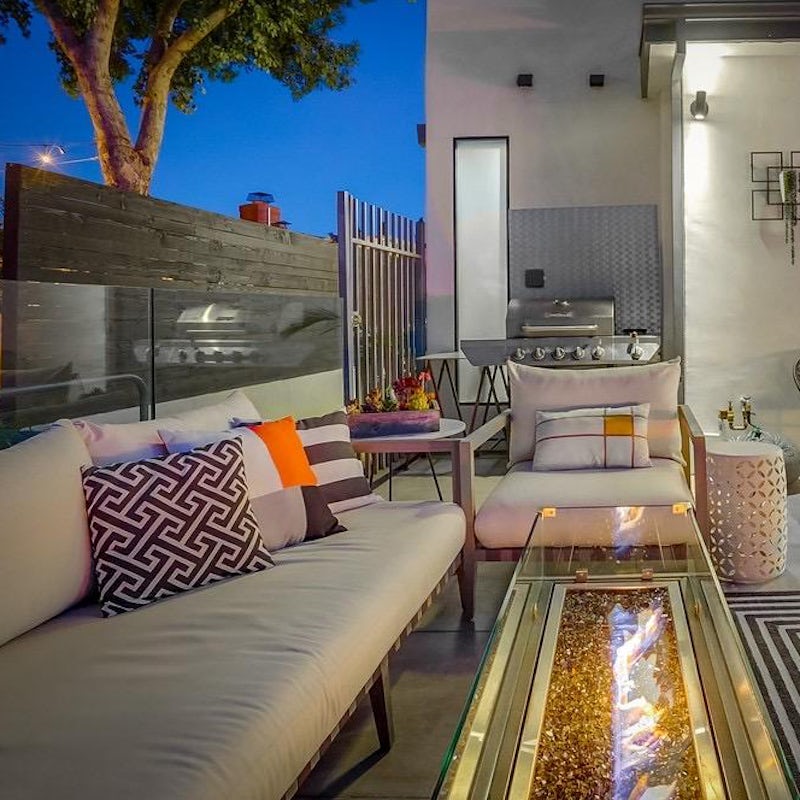Spend alfresco evenings sipping wine by the fire pit and cooking on the barbecue