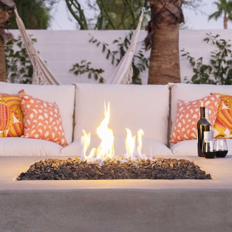 Light up the fire pit as night falls