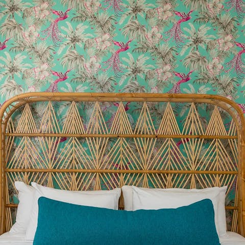 Admire the  intricately printed wallpaper