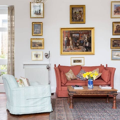 Admire the artwork as you sit back and relax in the comfy armchair