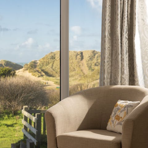 Sit with a book as the sand dunes make up the perfect backdrop