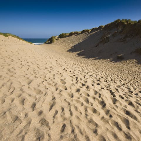 Step out of your front gate onto the path that leads directly to the beach